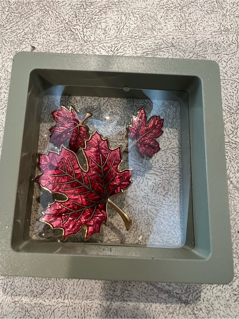 Red maple brooch and pierced earring set. Excellent condition